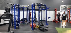 SYNRGY360 workout equipment blue and black with monkey bars and space for attachments available for sale at Club Fitness Dover